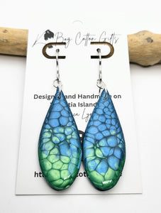 Handmade Earrings painted blue and green honeycomb effect design, coated with resin.